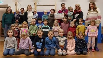 Spendenübergabe bei den Kindern vom Kath. KiGa St. Marien Lütmarsen. (Foto: privat)